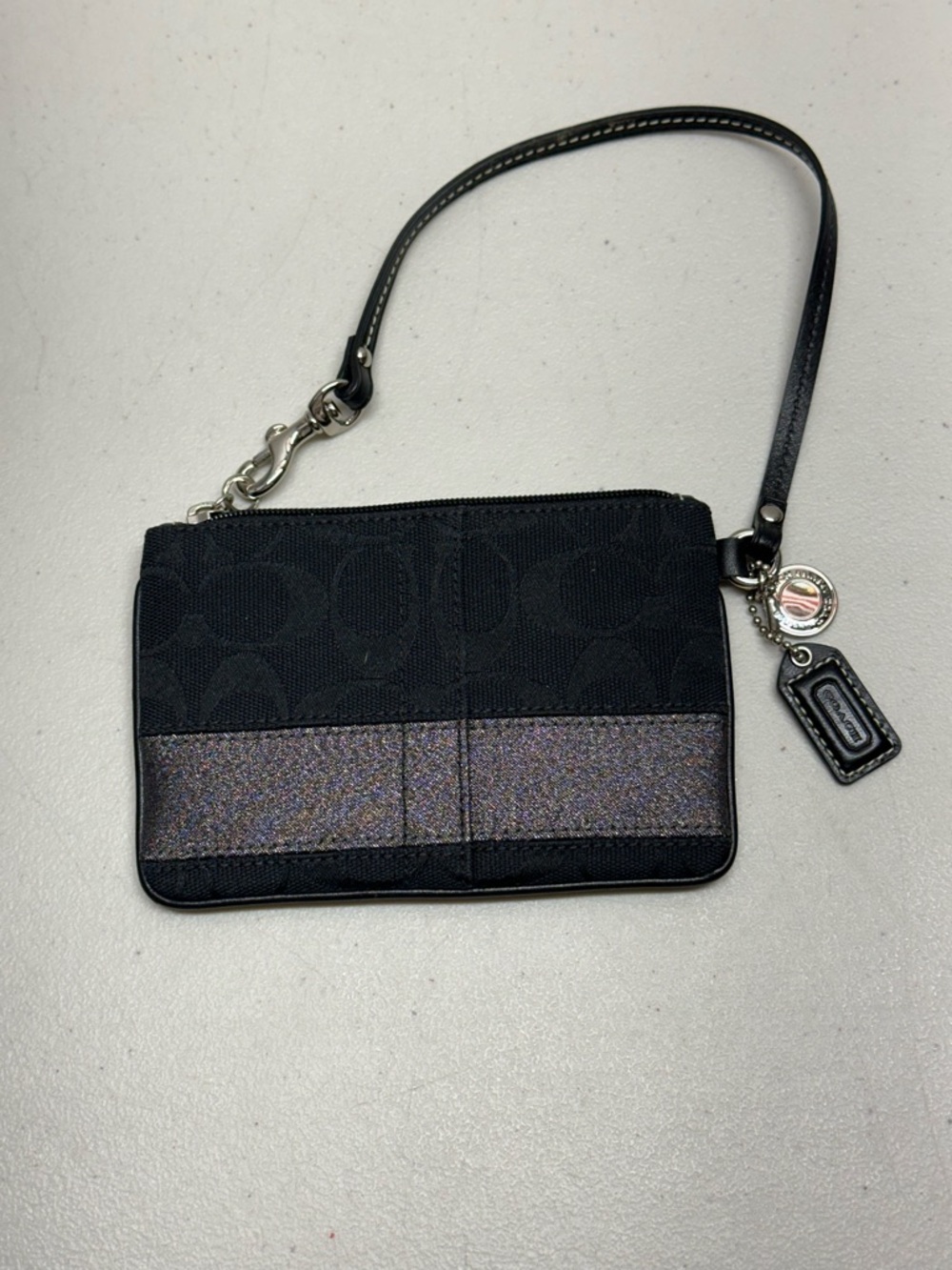 Coach black sparkle signature stripe wristlet 616